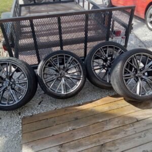 Set of 4 staggered zl1 wheel and tires.