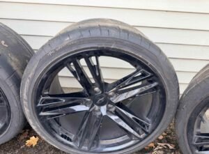 Black 20 inch staggered wheel and tire set - Image 4