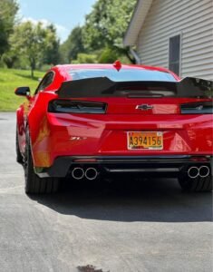 Listing a Red Hot Camaro trunk lid with a Streetfighter LA Carbon wing. I had this setup on my 2017 ZL1 and I’ve decided to change setups. Last year I changed the brake light to the newer black style from GM and that’s included. Spoiler was $1200 new. - Image 2